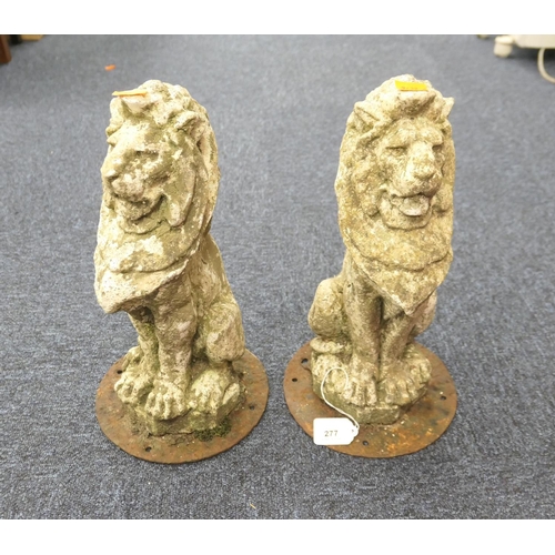 277 - Pair of reconstituted stone lion post terminals