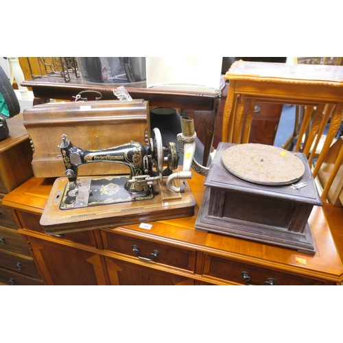 338 - Frister and Rossman walnut cased sewing machine and a table top gramophone (2)