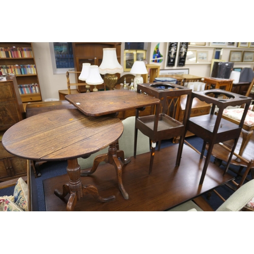 371 - Two 19th Century oak and elm tilt top tripod tables and two Georgian mahogany wash stands, both with... 