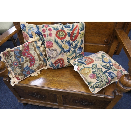 374 - Four tapestry cushions