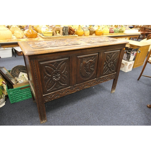 379 - Decorative carved oak coffer, width 117cm, depth 42cm, height 78cm