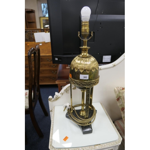 385 - Decorative gilt metal table lamp, height to the fitting 50cm