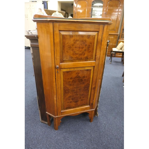 386 - Burr walnut free standing panelled corner cabinet, height 121cm