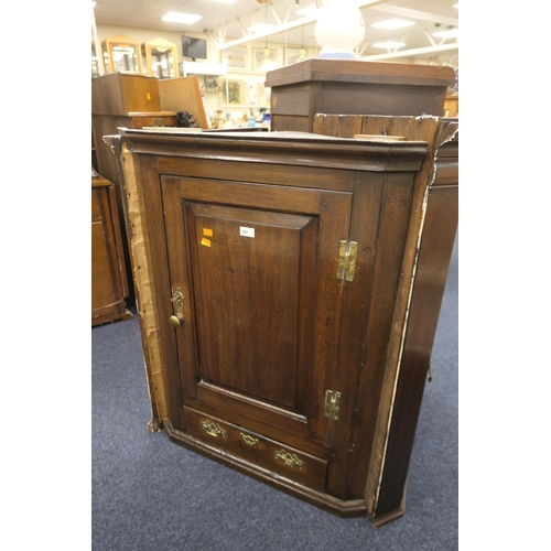 391 - George III provincial oak flat front hanging corner cupboard, fitted with a drawer and shaped shelve... 