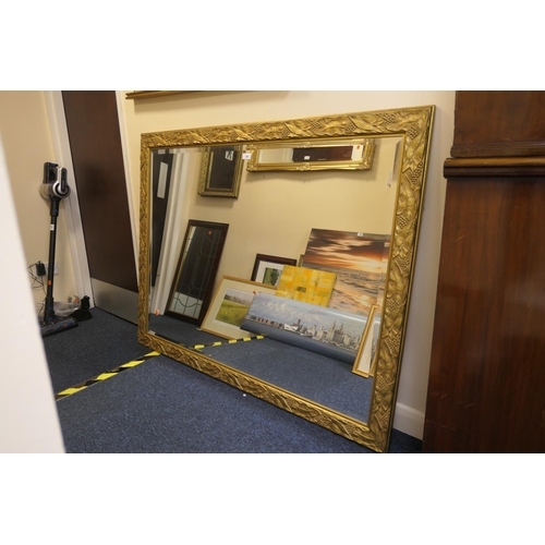 400 - Modern gilt framed ivy leaf moulded bevelled glass wall mirror, 136cm x 106cm