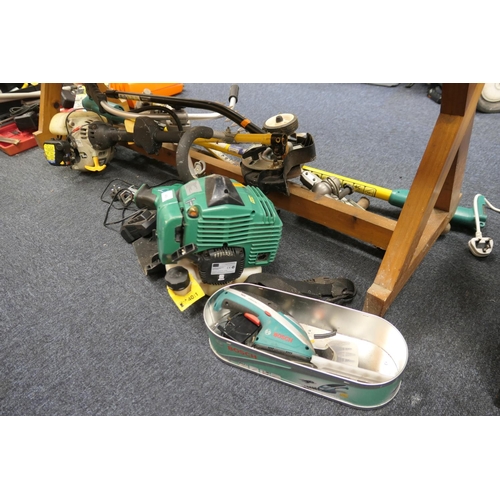 409 - Powered gardening tools including Gardenline petrol strimmer, petrol hedge trimmer etc