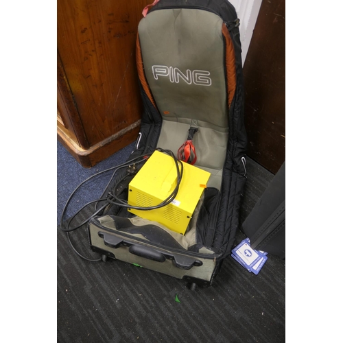 412 - Golf caddy electric charger and a Ping golf club travel bag (2)