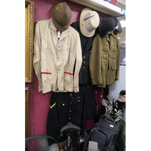 433 - Various tunics and headgear including fusilier's helmet, pith helmet, British rail cap, Manchester &... 