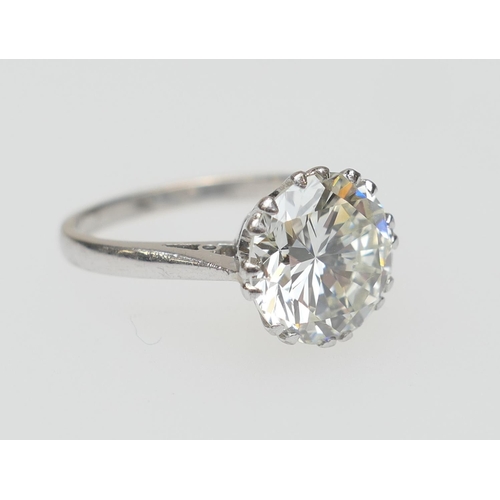 115 - Diamond solitaire ring, the round brilliant cut diamond certificated as being approx. 3.29cts, K/L i... 