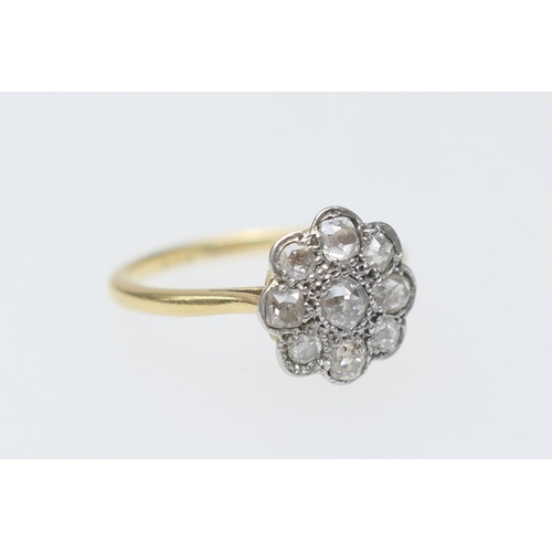 120 - Diamond cluster ring, set with eight mixed old cut diamonds and one replacement round brilliant, tot... 