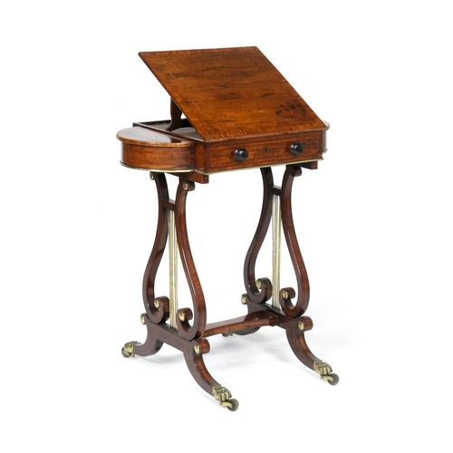 523 - Quality Regency rosewood work table, the satinwood banded lift up lectern top flanked on either side... 