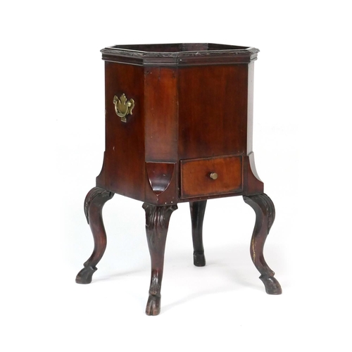 524 - Irish mahogany wine cooler, canted square form with brass carrying handles (liner deficient), fitted... 