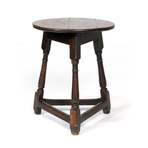 525 - Oak small cricket table, 19th Century, circular top on three turned legs united by a stretcher base,... 