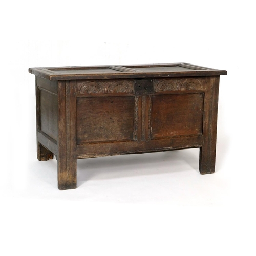 541 - Oak joined coffer, late 17th Century, the two recessed panel top opening to a partial candle box, th... 