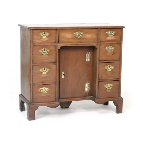 543 - Mahogany small kneehole desk, mid 18th Century with later alterations, fitted with three drawers and... 