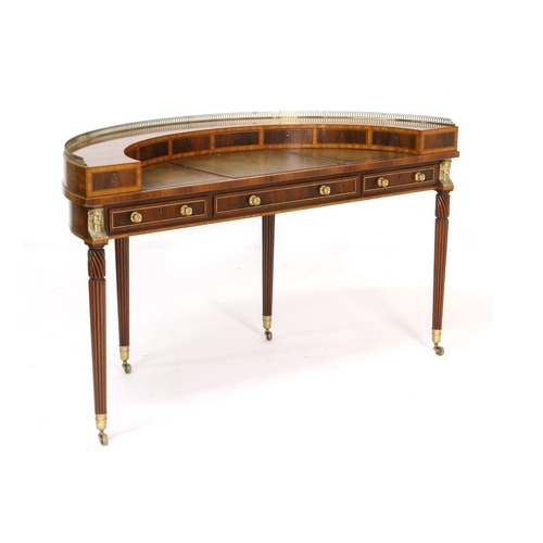 552 - William Tilman rosewood 'Regency' demi-lune writing table, having a brass galleried back fitted with... 