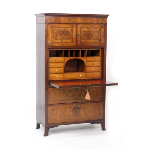 555 - George III mahogany secretaire a abbatant, circa 1780-1800, having two upper recessed panel cupboard... 