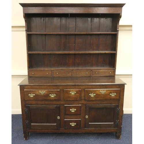 569 - North Wales oak dresser with boarded plate rack and spice drawers, 19th Century and later, width 142... 