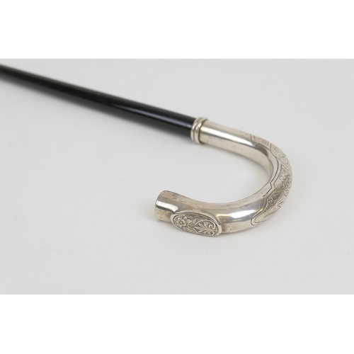 73 - Sterling silver mounted ebonised walking cane, the handle with engraved decoration, marked '925', wi... 