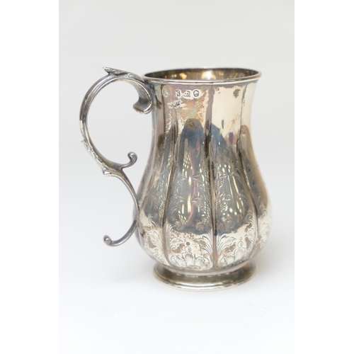 85 - Victorian silver tankard, Sheffield 1856, baluster form with acanthus and scallop engraved decoratio... 