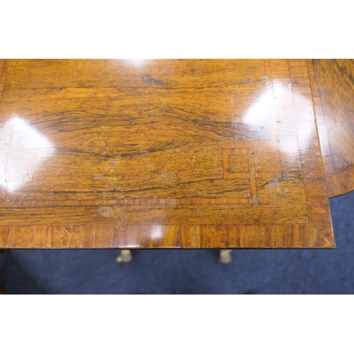 523 - Quality Regency rosewood work table, the satinwood banded lift up lectern top flanked on either side... 