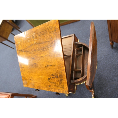 523 - Quality Regency rosewood work table, the satinwood banded lift up lectern top flanked on either side... 