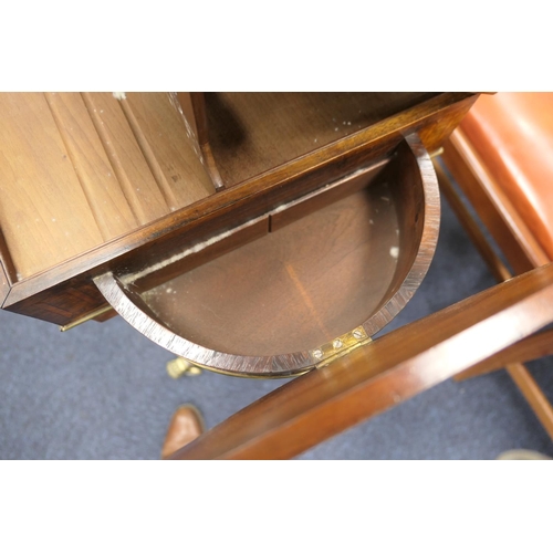 523 - Quality Regency rosewood work table, the satinwood banded lift up lectern top flanked on either side... 