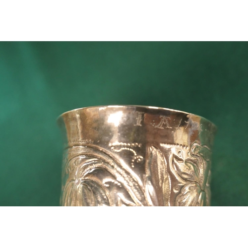 11 - English provincial silver beaker, circa 1690, slight tapered form with an engraved band of tulips an... 