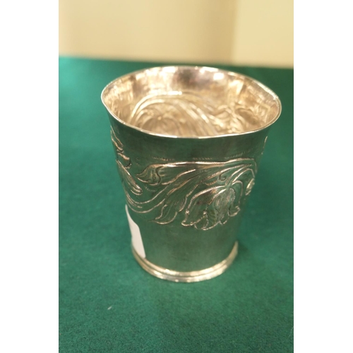 11 - English provincial silver beaker, circa 1690, slight tapered form with an engraved band of tulips an... 