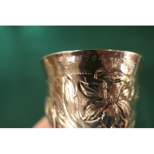 11 - English provincial silver beaker, circa 1690, slight tapered form with an engraved band of tulips an... 