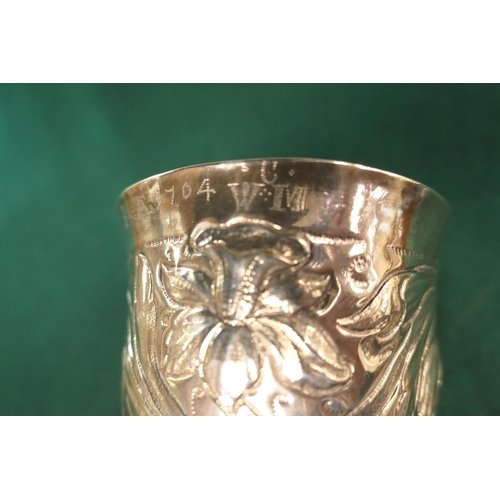 11 - English provincial silver beaker, circa 1690, slight tapered form with an engraved band of tulips an... 