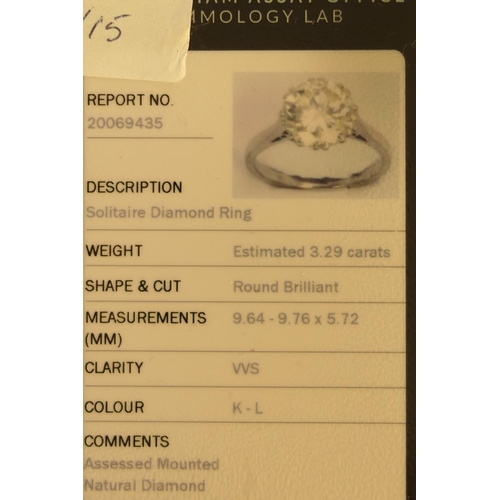 115 - Diamond solitaire ring, the round brilliant cut diamond certificated as being approx. 3.29cts, K/L i... 