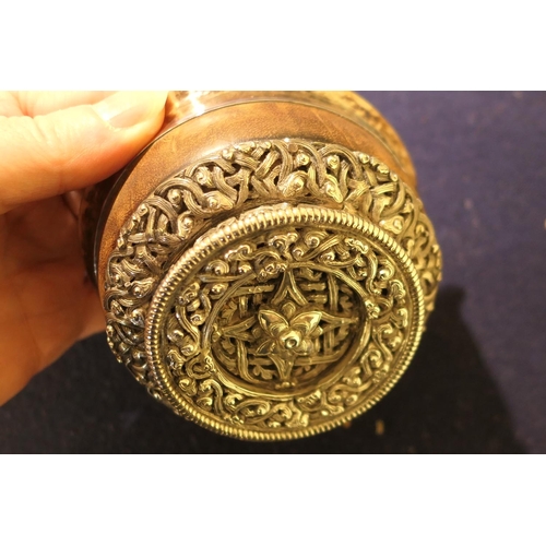 47 - Tibetan white metal mounted mazer bowl, late 19th Century, white metal lining, having an intricate b... 