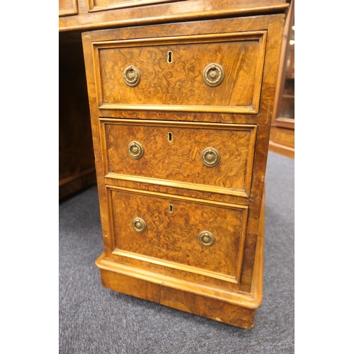 536 - Victorian burr walnut twin pedestal desk, gilt tooled green leather inset top over three moulded fri... 