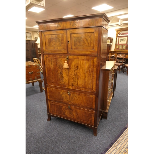 555 - George III mahogany secretaire a abbatant, circa 1780-1800, having two upper recessed panel cupboard... 