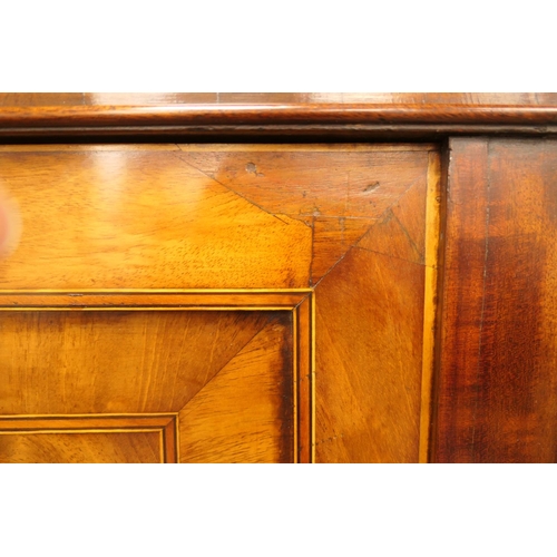 555 - George III mahogany secretaire a abbatant, circa 1780-1800, having two upper recessed panel cupboard... 