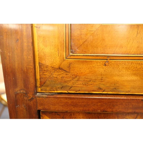 555 - George III mahogany secretaire a abbatant, circa 1780-1800, having two upper recessed panel cupboard... 