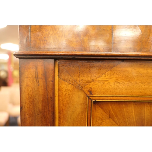 555 - George III mahogany secretaire a abbatant, circa 1780-1800, having two upper recessed panel cupboard... 