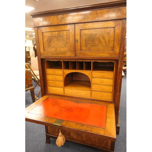 555 - George III mahogany secretaire a abbatant, circa 1780-1800, having two upper recessed panel cupboard... 