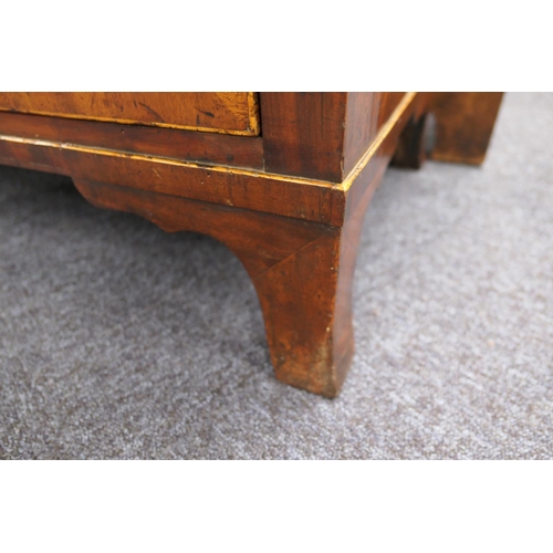 555 - George III mahogany secretaire a abbatant, circa 1780-1800, having two upper recessed panel cupboard... 