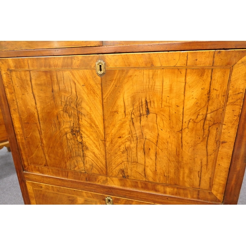 555 - George III mahogany secretaire a abbatant, circa 1780-1800, having two upper recessed panel cupboard... 