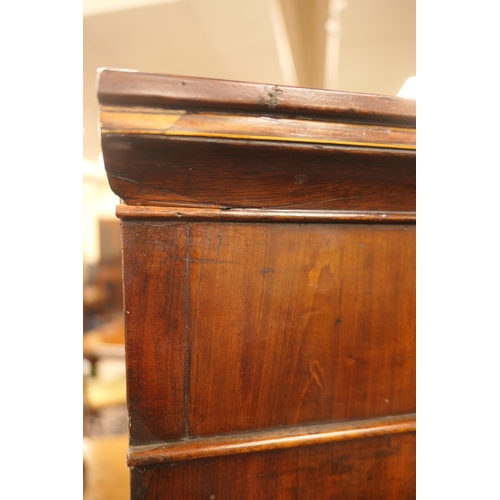 555 - George III mahogany secretaire a abbatant, circa 1780-1800, having two upper recessed panel cupboard... 