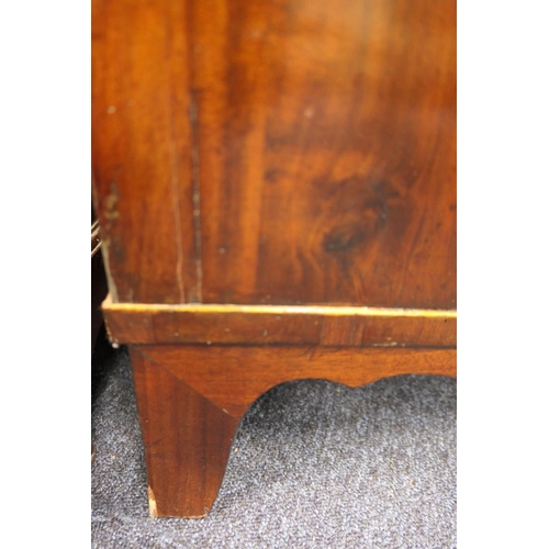 555 - George III mahogany secretaire a abbatant, circa 1780-1800, having two upper recessed panel cupboard... 