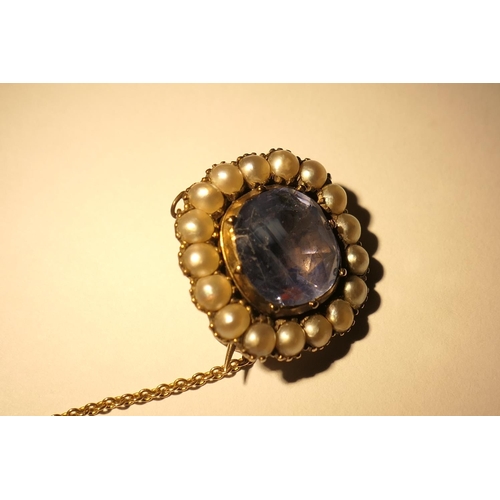 100 - Victorian sapphire and pearl brooch, the cushion cut sapphire certified as natural, estimated to wei... 