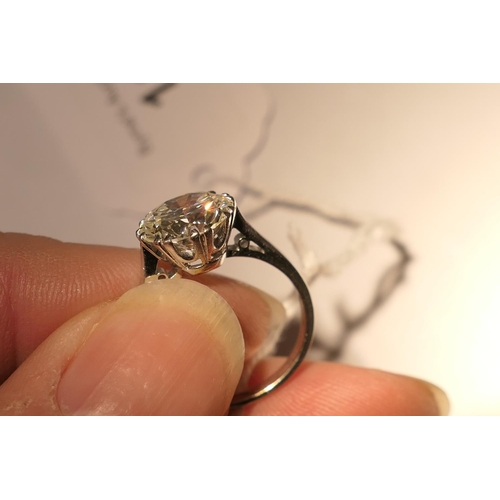 115 - Diamond solitaire ring, the round brilliant cut diamond certificated as being approx. 3.29cts, K/L i... 