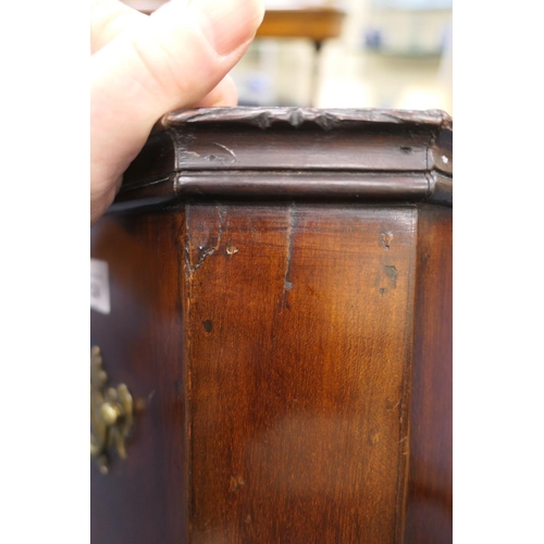 524 - Irish mahogany wine cooler, canted square form with brass carrying handles (liner deficient), fitted... 