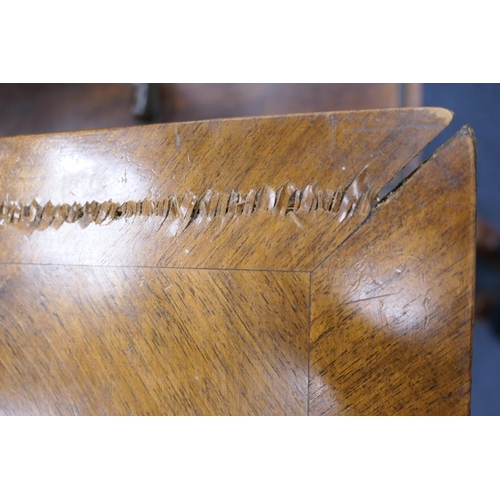 549 - Walnut chest of drawers, in part 18th Century with later restoration, fitted with two short and thre... 