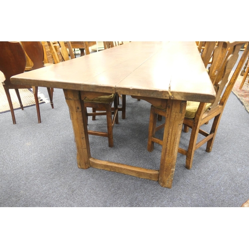 556 - Oak refectory table, Mid 17th Century and later, three plank top patinated and with some old graffit... 