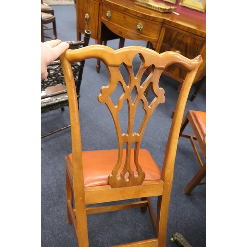 574 - Set of eight mahogany dining chairs in the Chippendale style, 20th Century, with red leatherette squ... 