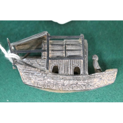 76 - Chinese silver miniature model of a junk, marked, 6cm, weight approx. 26g; also a further miniature ... 